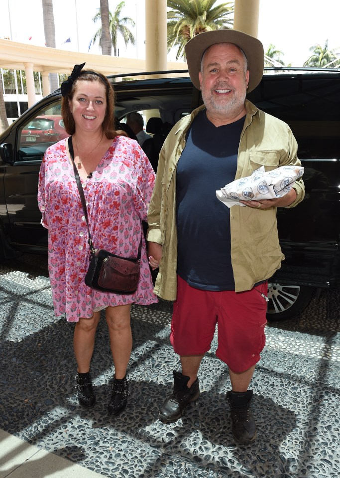  Cliff Parisi, 59, beamed as he arrived back at the five-star Palazzo Versace hotel with wife Tara Wyer