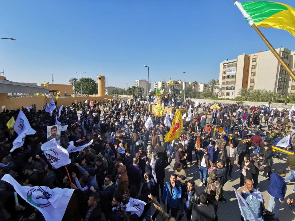 Hundreds of pro-Iran protesters try to storm US embassy in Iraq after strikes