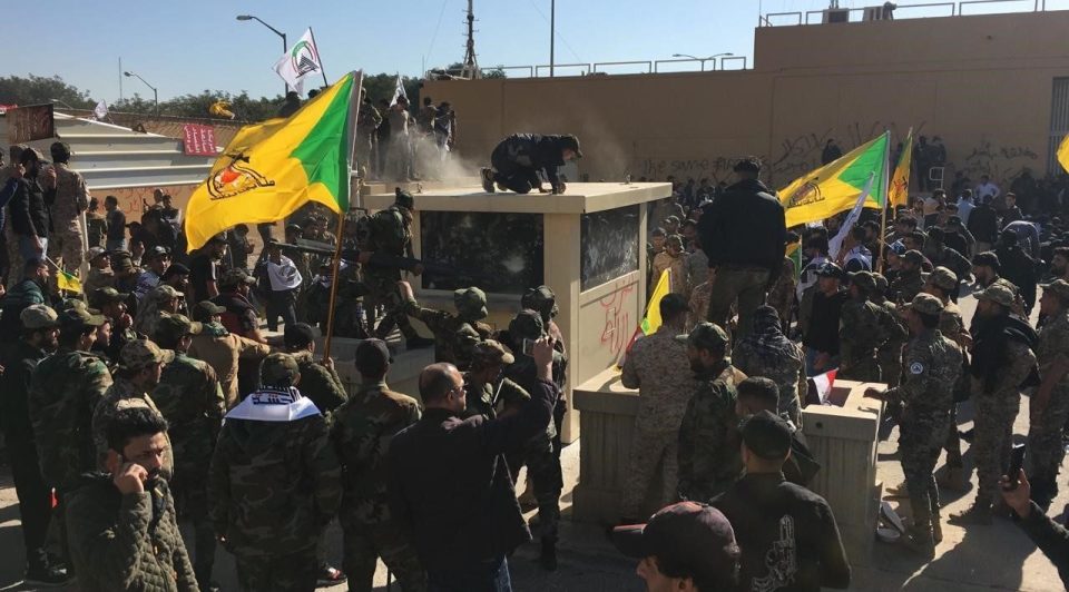 Hundreds of pro-Iran protesters try to storm US embassy in Iraq after strikes