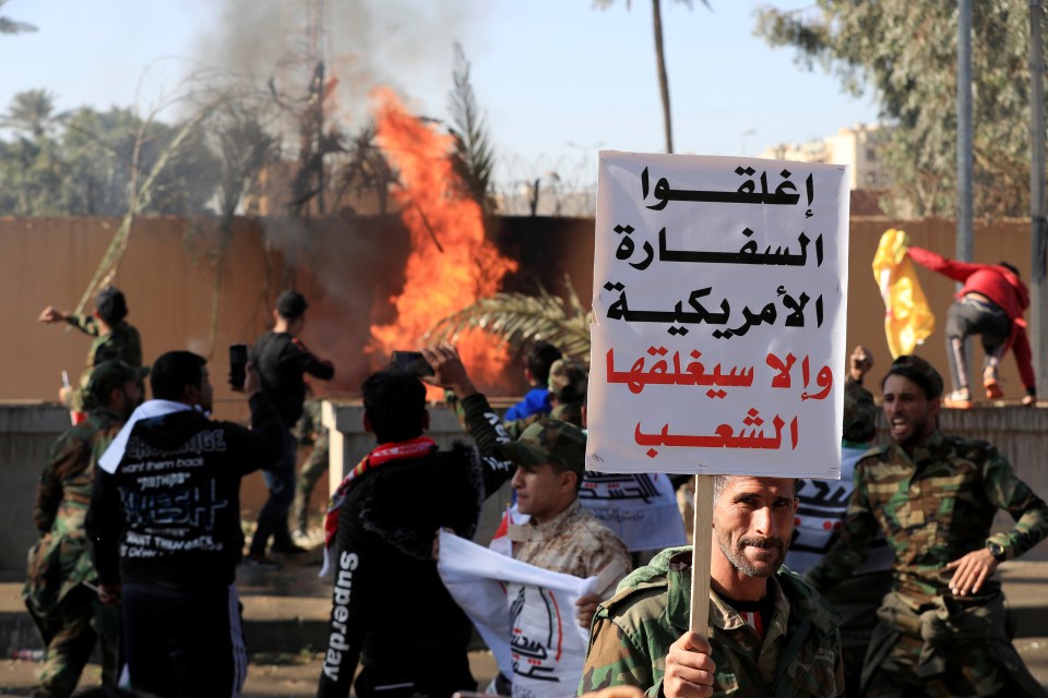 Gunfire was heard as security forces to to keep the mob at bay