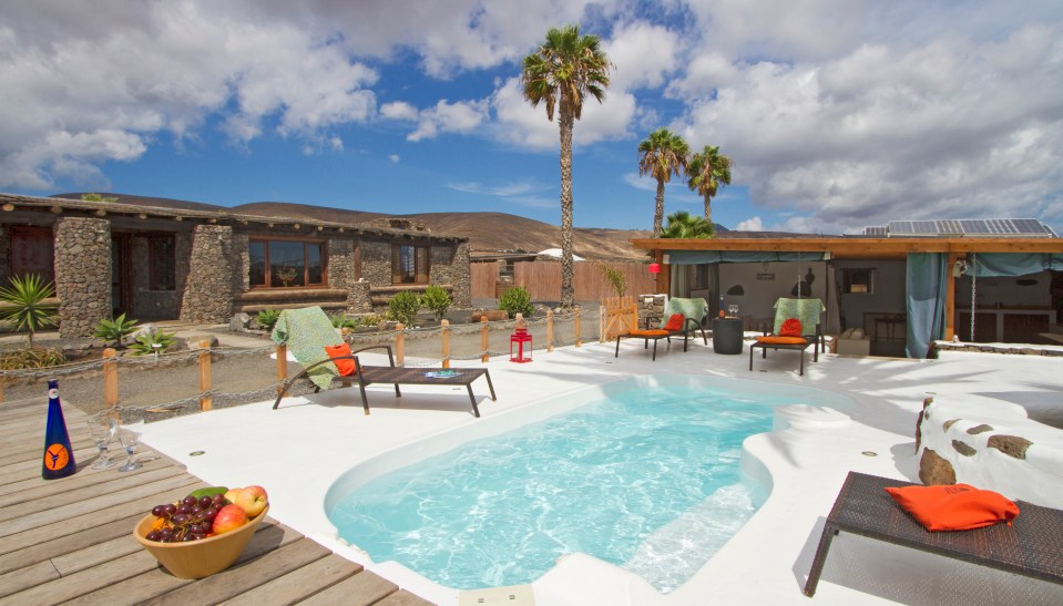  Surrounded by beautiful black sand beaches, the main villa holds a private solar-heated pool, as well as a hot tub and table tennis