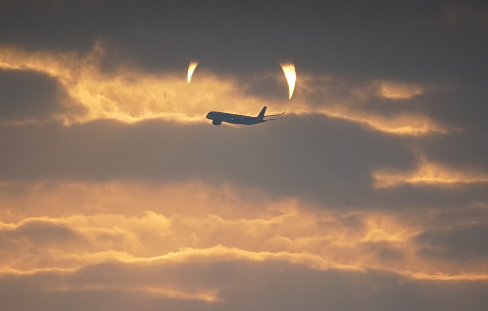 The photographer also captured the crescent in the sky behind the clouds