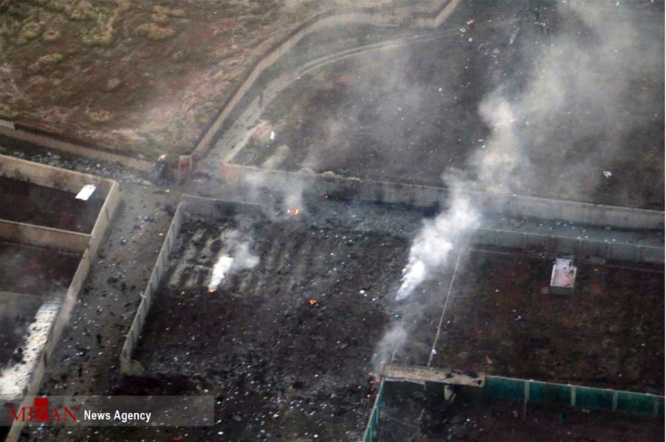  Smoke rises after the fireball killed all 176 people on board