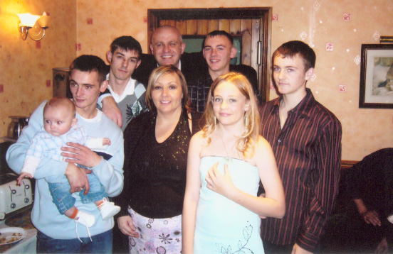  Stewart Swift (left) holding his baby son Taylor, with his parents Andrew and Carol, brothers Christopher, Graig and Ryan, and sister Stacie.