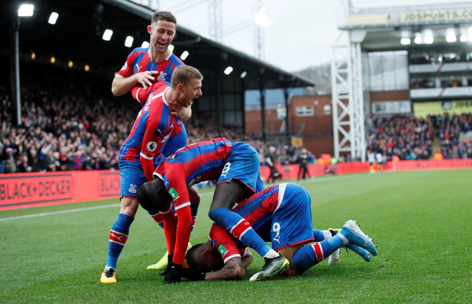 The striker was mobbed by his teammates after levelling the London derby