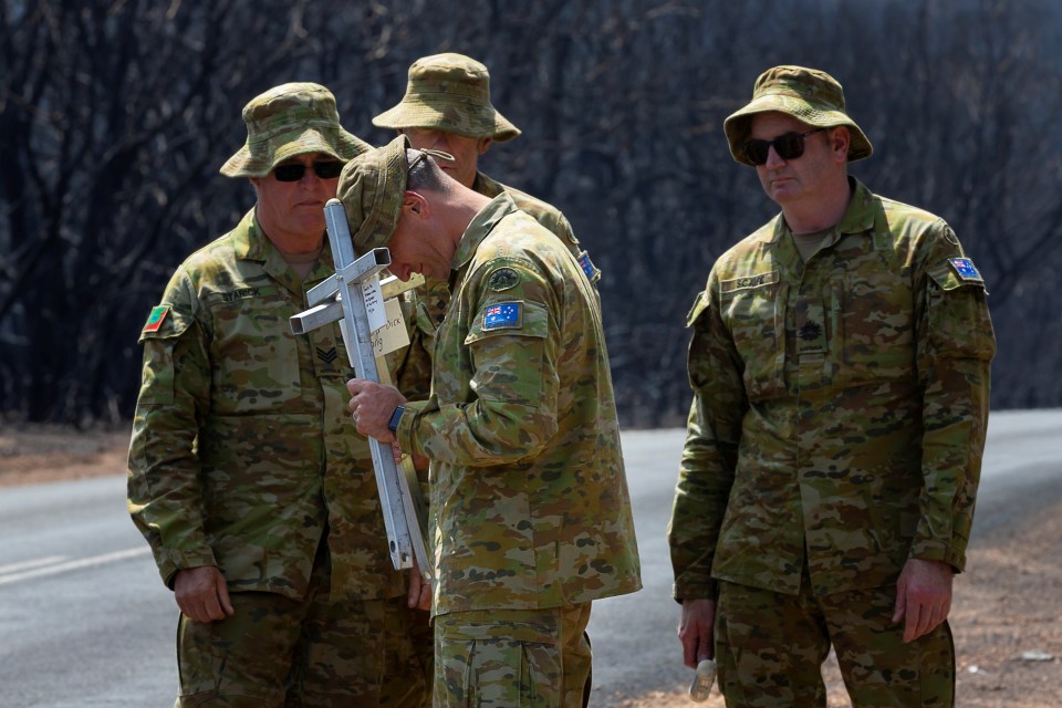  Lieutenant Kynan visits the scene where his uncle and cousin, Dick and Clayton Lang, died in a bushfire to place a memorial on Kangaroo Island