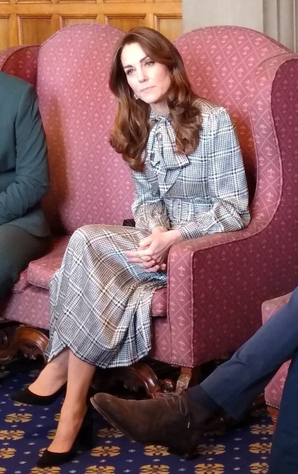 Kate looks elegant in a black and white Zara dress