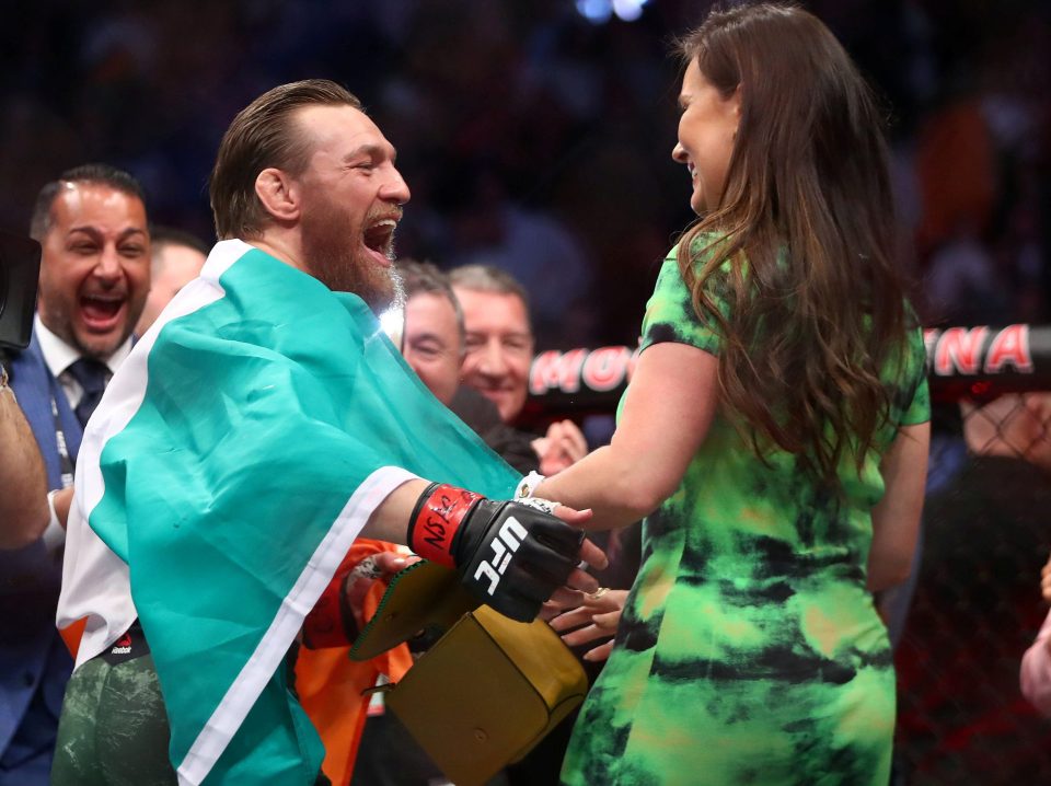  Conor McGregor celebrates his victory with his partner Dee Devlin
