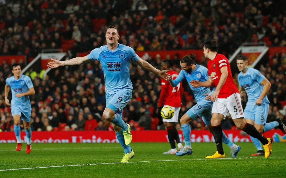  Woods reels off in celebration as United looked on stunned