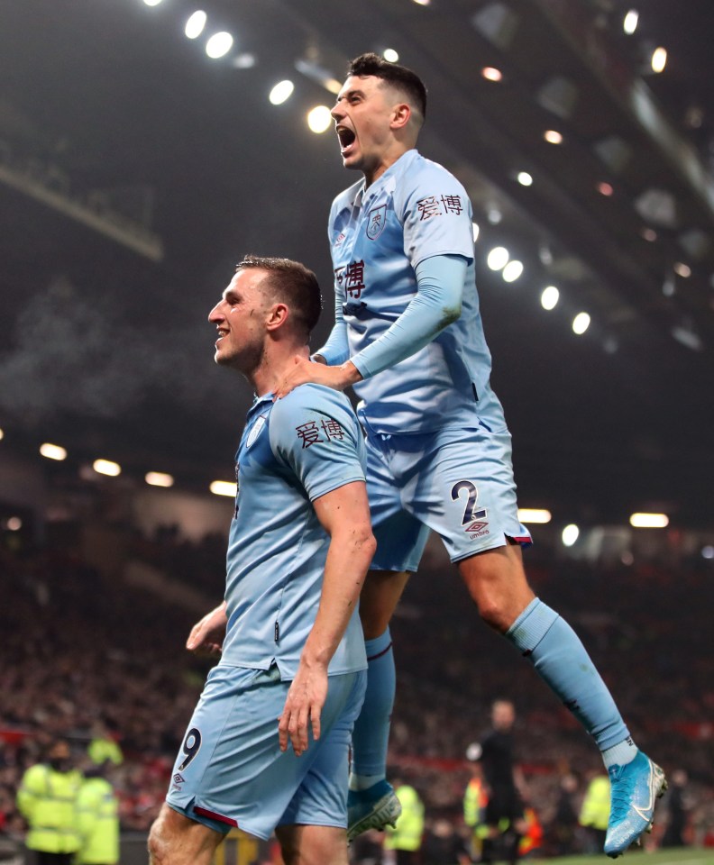  Burnley celebrate the opening goal at Old Trafford