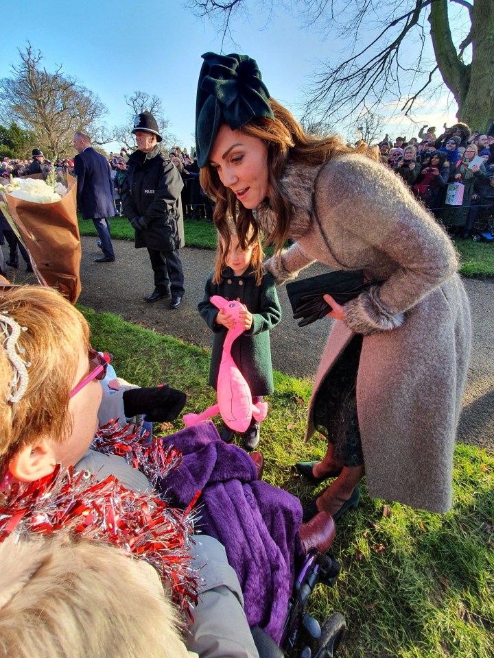 Doting mum Kate stood by her daughter as they spoke with locals