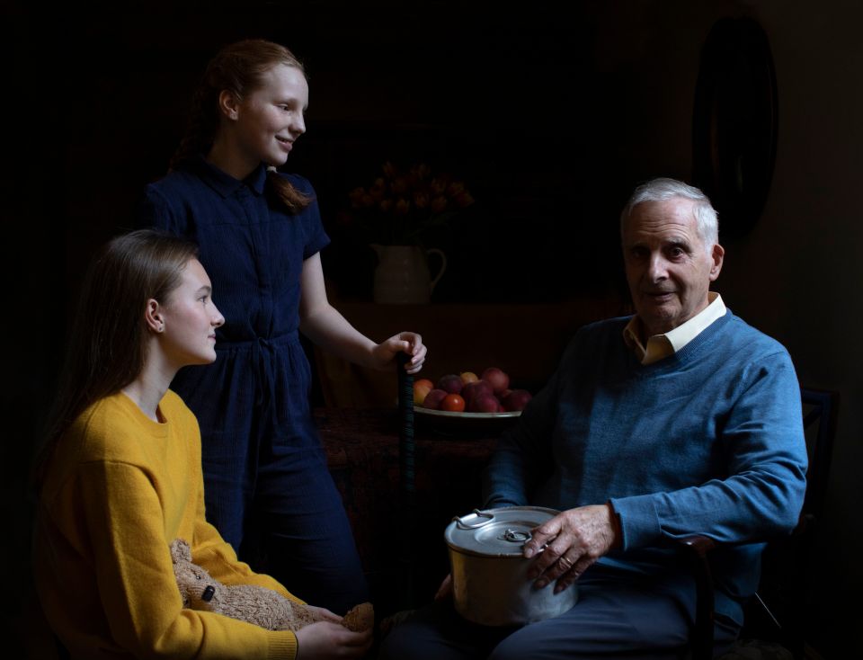  Steven Frank, 84, survived multiple concentration camps as a child, pictured with his granddaughters Maggie and Trixie