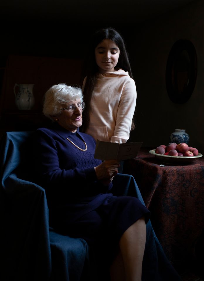  Yvonne Bernstein, originally from Germany, shows her granddaughter Chloe Wright her German ID card