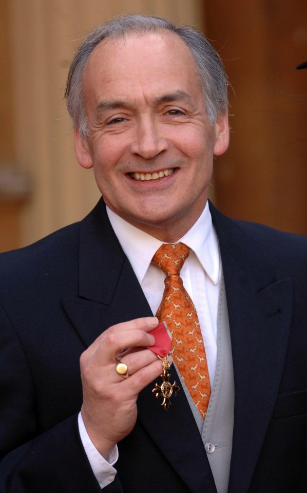 The presenter poses with his OBE