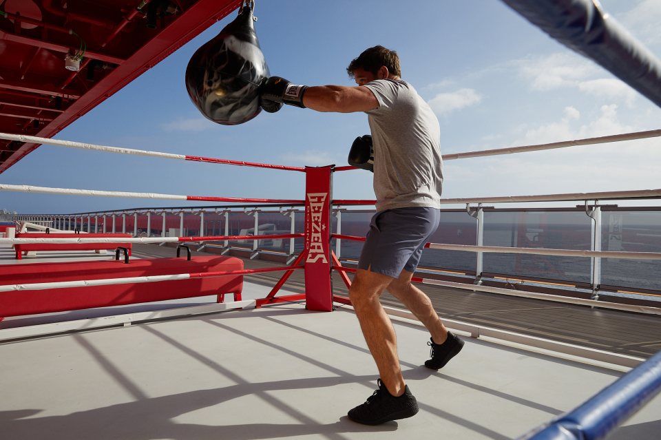 The outdoor gym area includes a boxing gym and gymnastics equipment