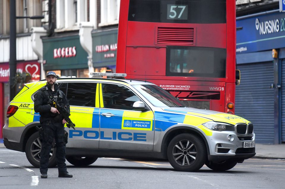  Armed police at the scene in Streatham High Road