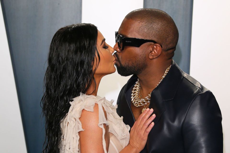  Kim Kardashian looked incredible as she kissed husband Kanye West at the star-studded Vanity Fair Oscars afterparty