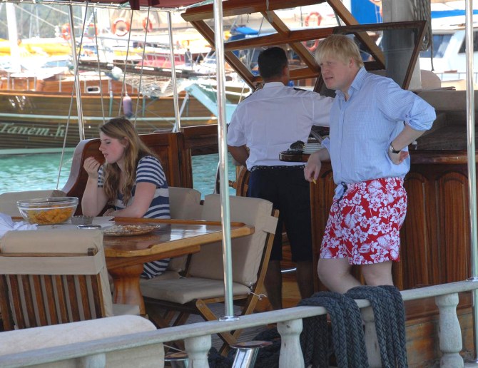 The PM was snapped sporting a fetching long-sleeved shirt and swimming shorts combo while holidaying in the Caribbean