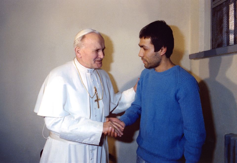  Mehmet Ali Agca meeting Pope John Paul II after he shot him