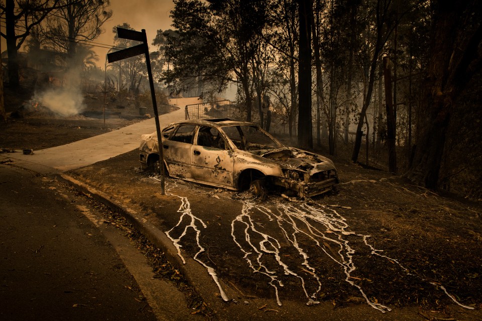 A car melts after temperatures soared to 660C during the wild fires In Australia