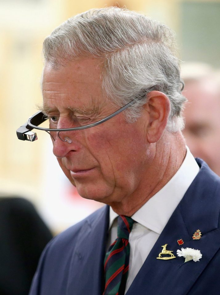  Prince Charles trying on a pair of Google Glass glasses
