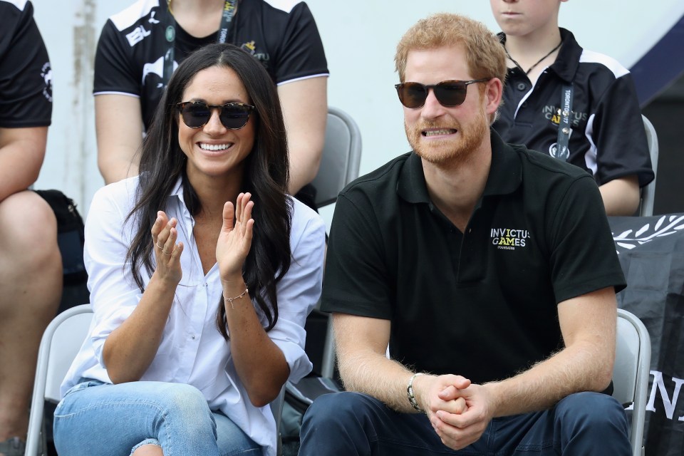 Meghan Markle and Prince Harry at a wheelchair tennis match during the Invictus Games 2017