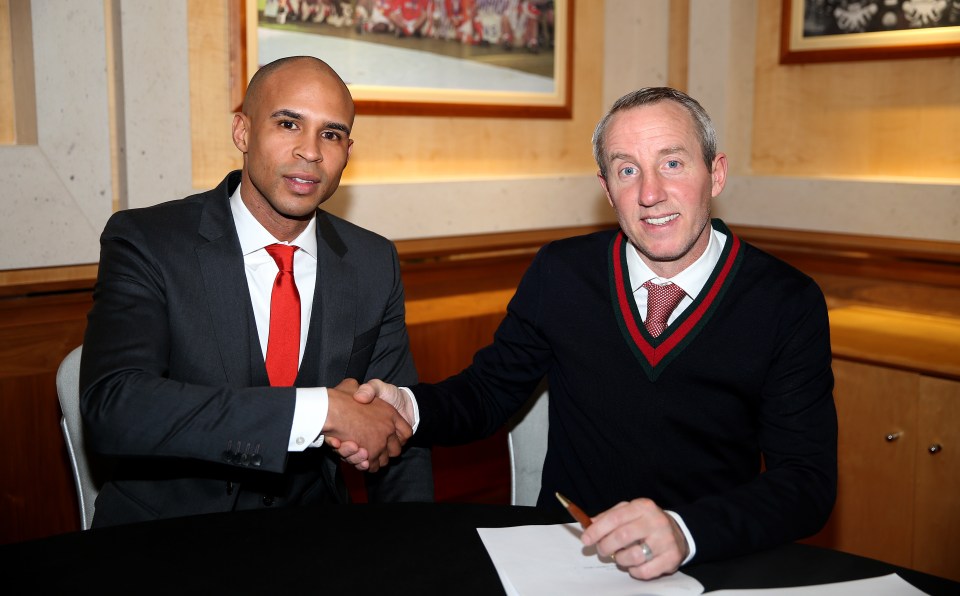 Charlton chairman Matt Southall, left, shakes hand with manager Lee Bowyer