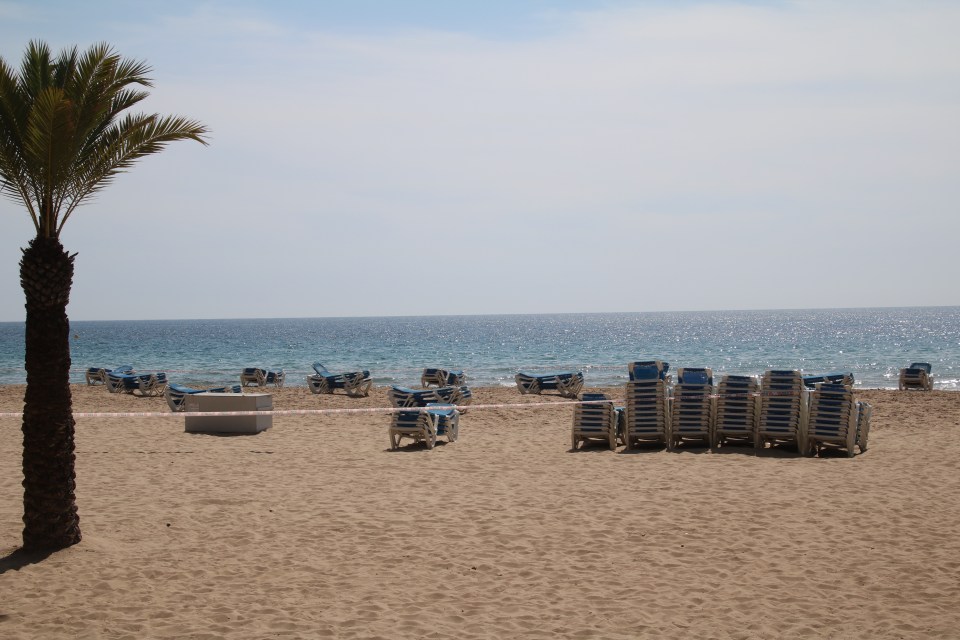 A deserted beach in the popular Spanish holiday resort