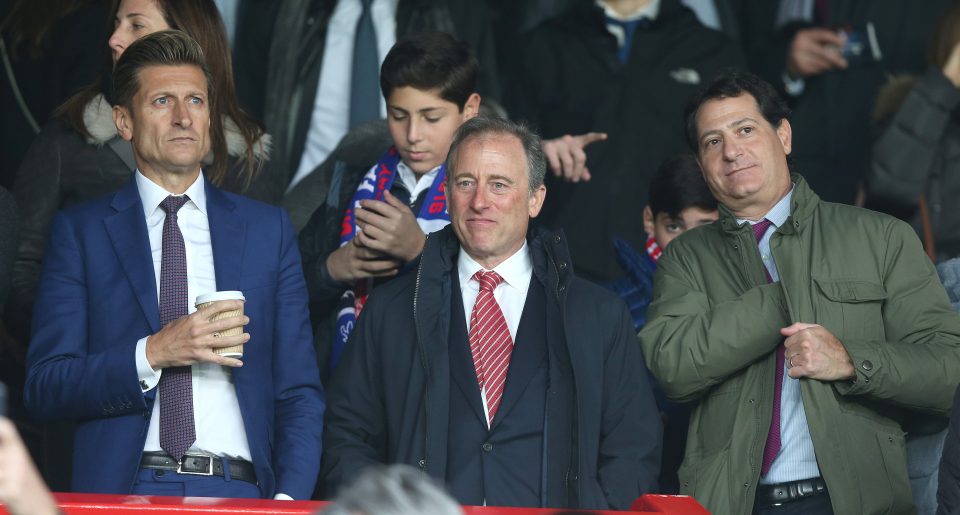  Harris (middle) runs the Eagles alongside Steve Parish (left) and David Blitzer (right)