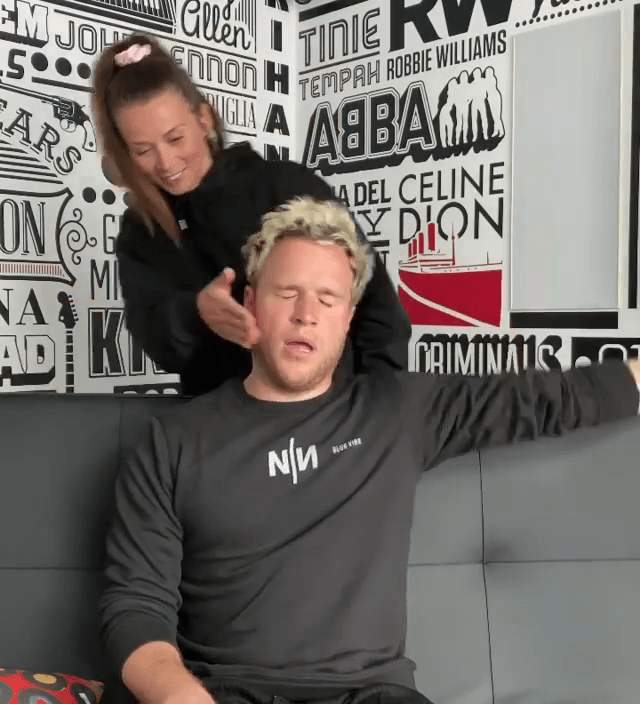  Olly was told to pull an invisible string - and even up getting smacked in the face