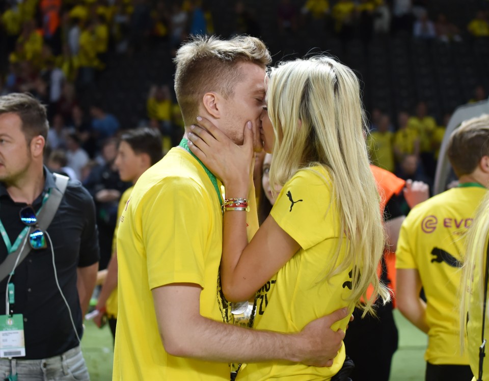  Reus will be watching at home with wife Scarlett