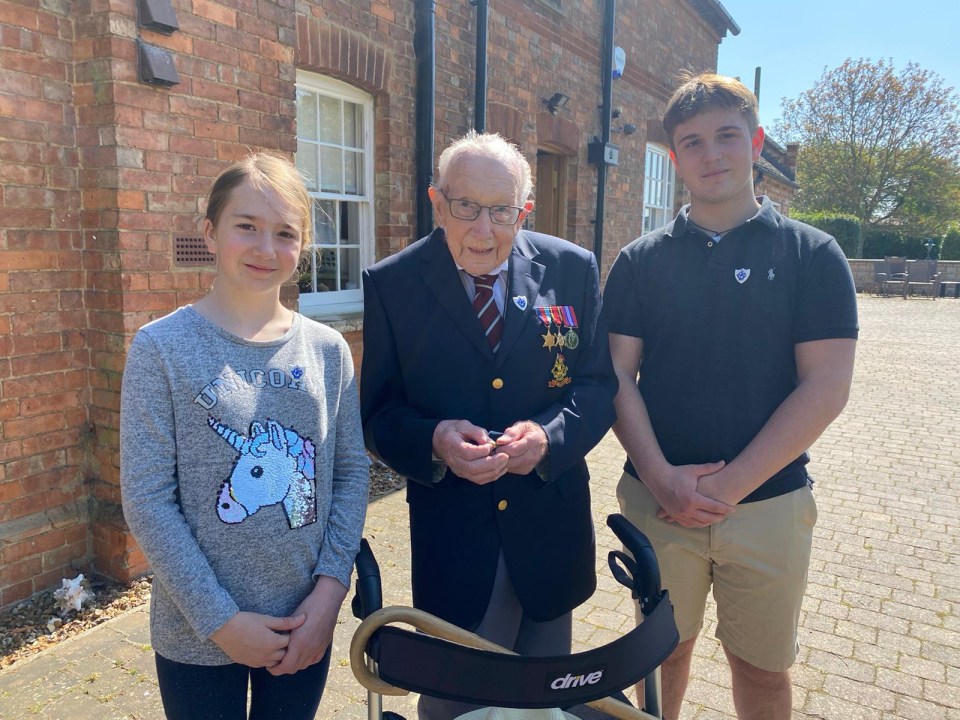  Colonel Tom Moore was surprised by grandkids Benji and Georgia as he was awarded a gold Blue Peter Badge