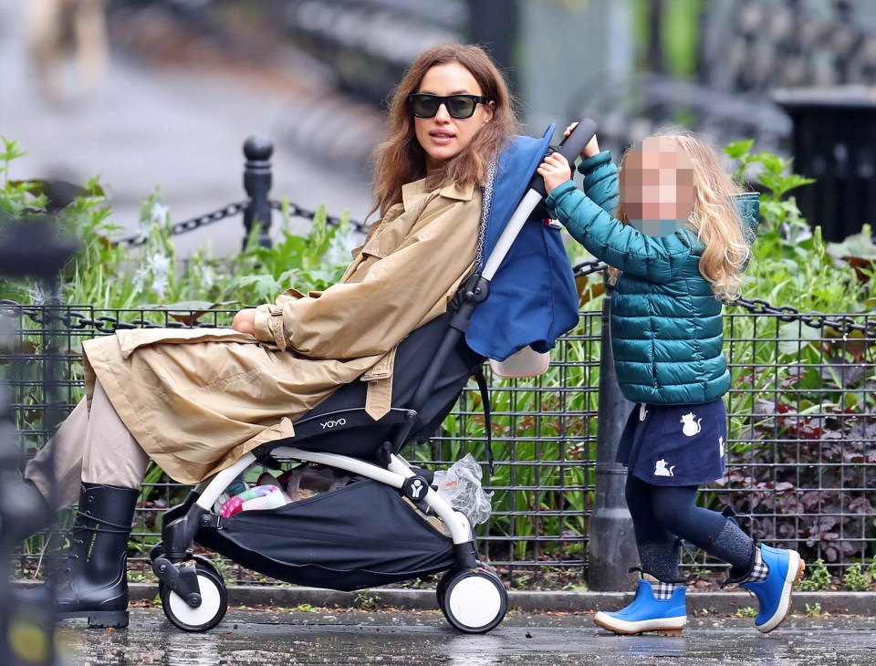 Irina Shayk took a seat while daughter Lea pushed her around in her pushchair
