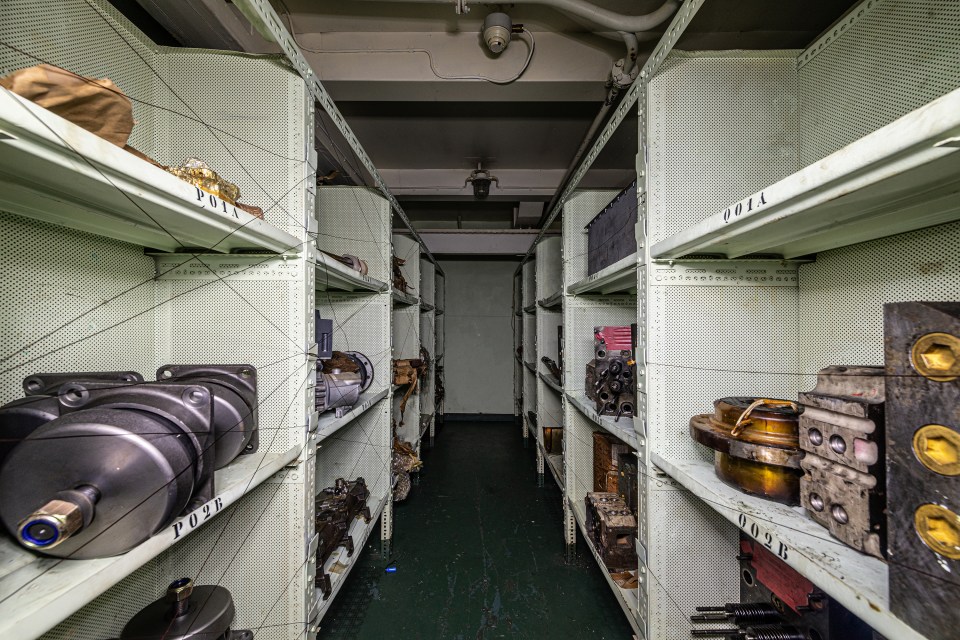  A room of what appear to be replacement mechanical parts