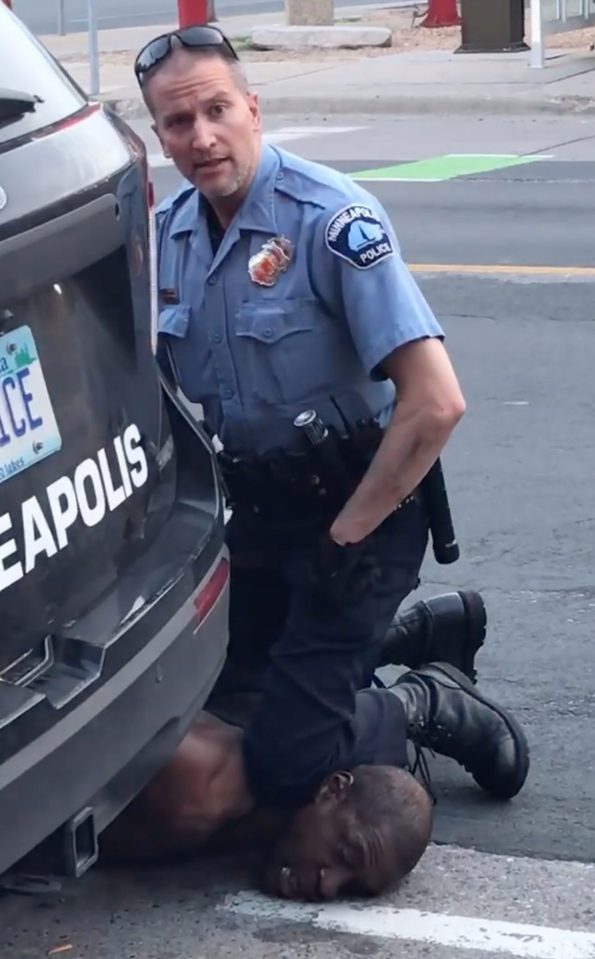  Video shows the moment a police officer kneels on the neck of George Floyd who later died