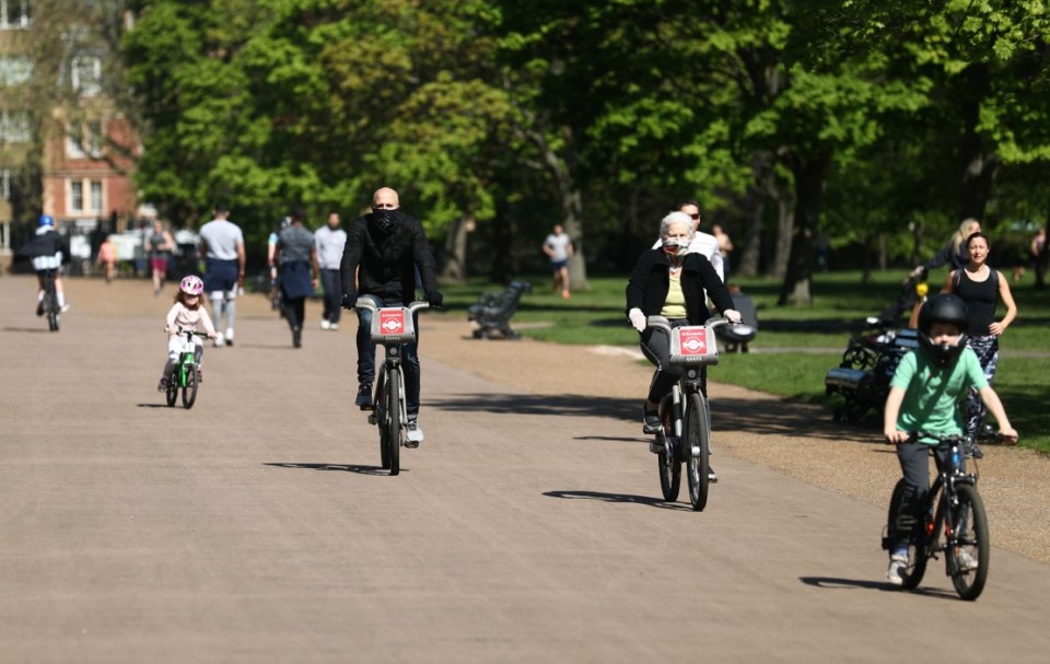  People cycle in Kensington Palace Park, Central London