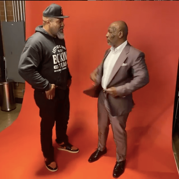  Briggs alongside Tyson after appearing on his podcast