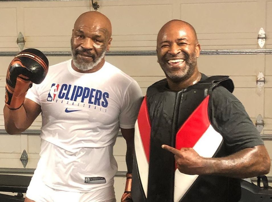  Mike Tyson next to his new trainer, MMA coach Rafael Cordeiro