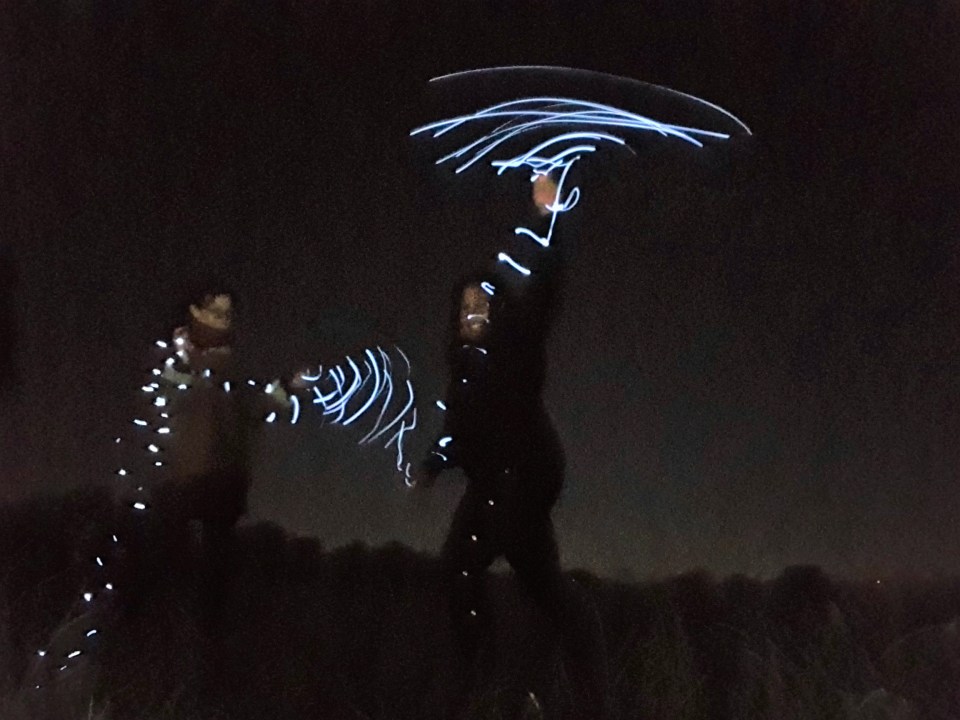 Police have released these images of the two women dancing with fairy lights on the night they were killed