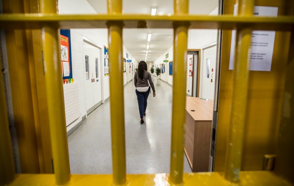  A female prison warder patrols HMP Bronzefield, in Middlesex, the largest women-only prison in Europe