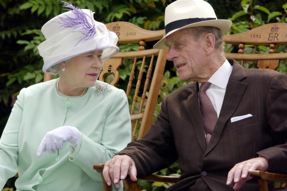 The Queen and Prince Philip pictured during a musical performance in the Abbey Gardens, Bury St Edmunds, during her Golden Jubilee visit to Suffolk