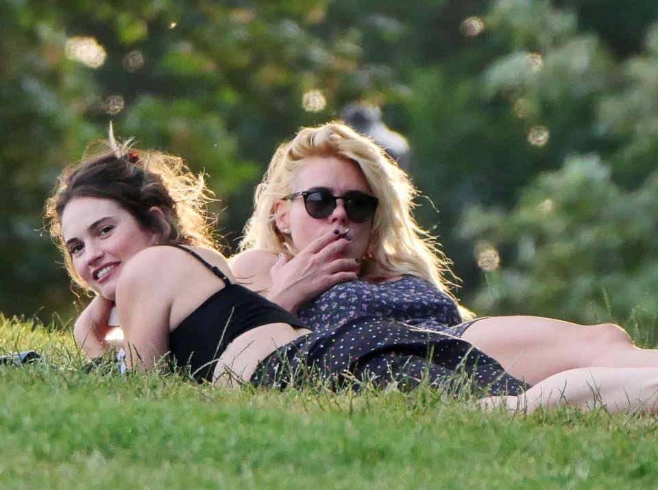 Singer-turned-actress Billie Piper relaxed in shades and a floral dress while puffing on a cigarette