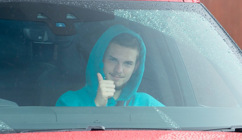 Liverpool starlet Harvey Elliott also smiles and signals to our snapper