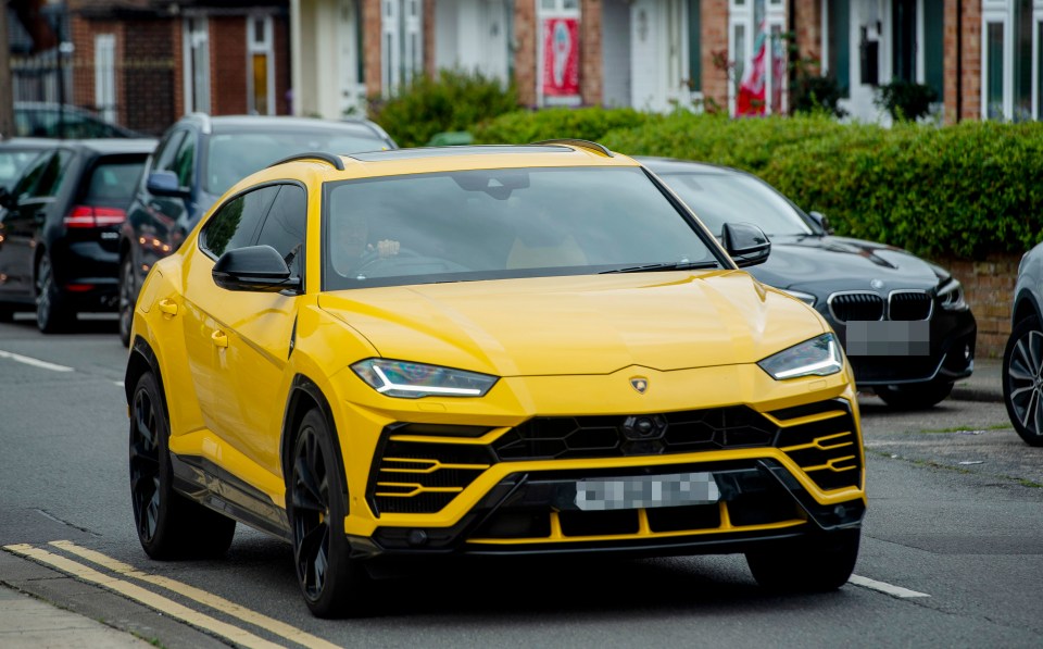 Teammate Roberto Firmino cruised in in a bright yellow Lamborghini Urus