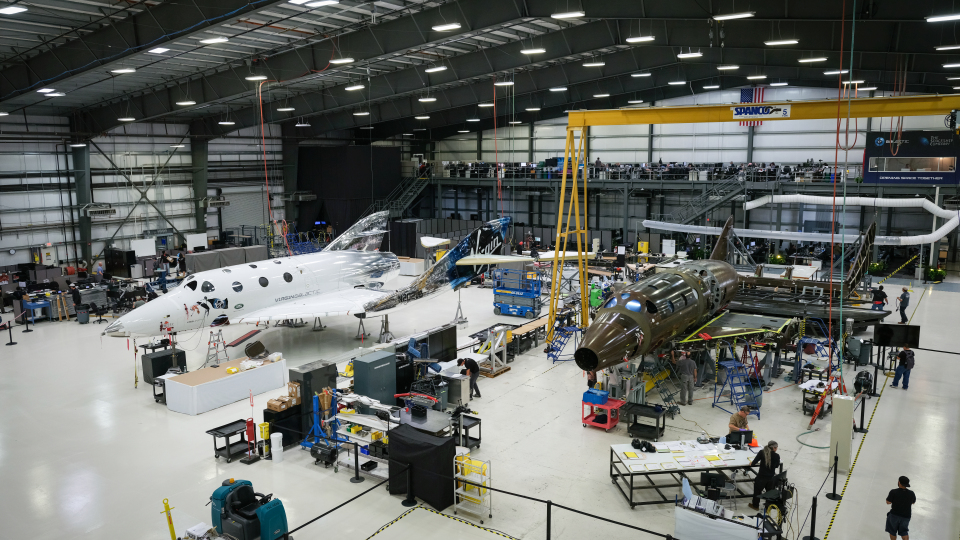 The vehicle (right) is the followup to Virgin Galactic's first plane, VSS Unity. They could take tourists into space as early as this year