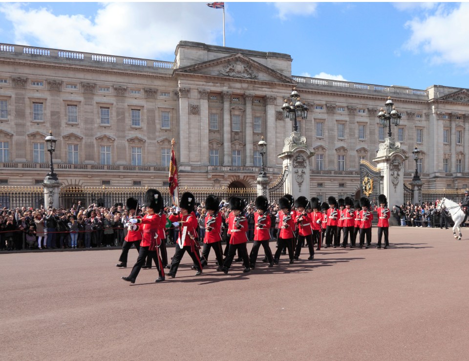 Spacey and Maxwell sat on the thrones in Buckingham Palace in London