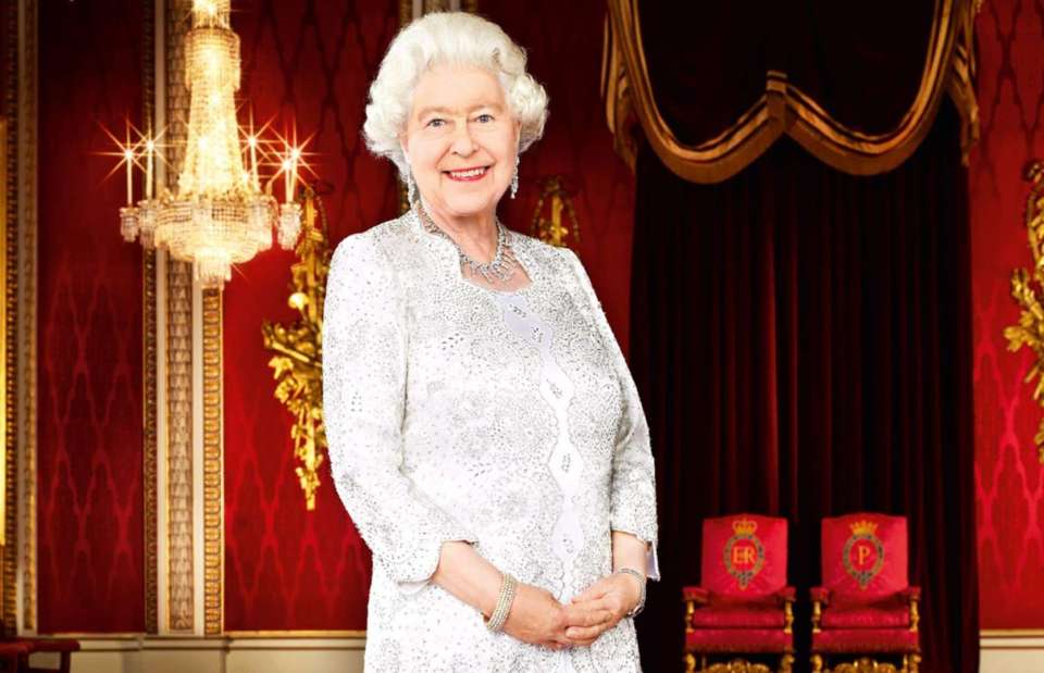 The ceremonial red velvet chairs are occupied by the Queen and Prince Philip on state occasions