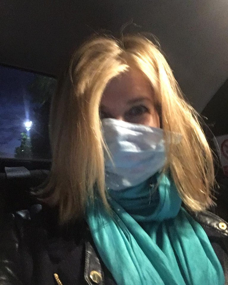 She wore a face mask in the car on the way to work