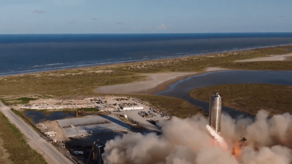 Bits of debris appeared to leap from the launchpad as the rocket took flight