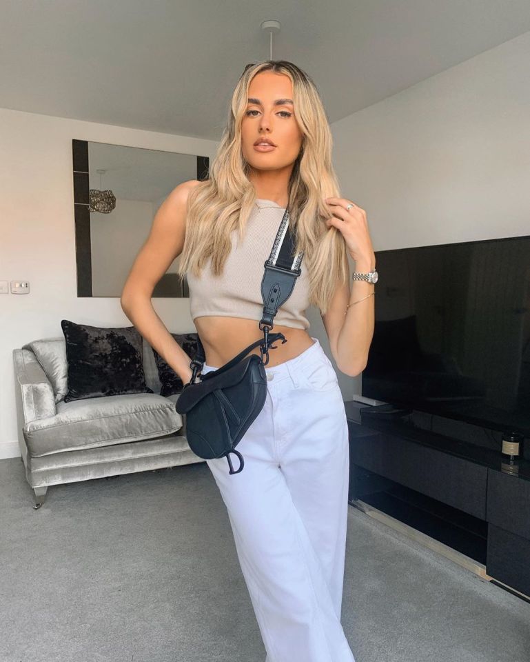 Amber, 26, has bought the lush three-storey pad after 'wasting' money renting in London